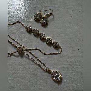 Necklace, bracelet, and earrings costume jewelry